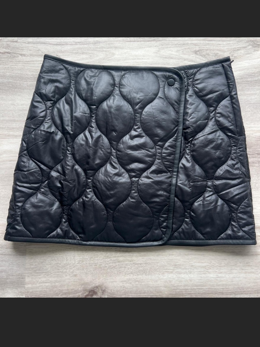Promesa Quilted Wrap Mini Skirt in Black